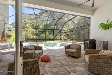 Stunning Halifax Plantation golf course custom pool home on a on Halifax Plantation Golf Club in Florida - for sale on GolfHomes.com, golf home, golf lot