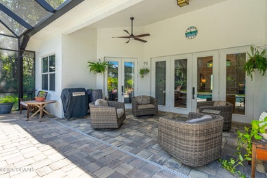 Stunning Halifax Plantation golf course custom pool home on a on Halifax Plantation Golf Club in Florida - for sale on GolfHomes.com, golf home, golf lot