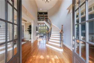 Discover this exceptional executive home situated on a serene 1 on Trophy Club of Apalachee in Georgia - for sale on GolfHomes.com, golf home, golf lot