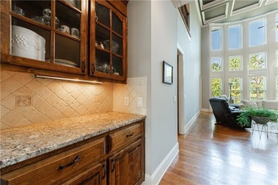 Discover this exceptional executive home situated on a serene 1 on Trophy Club of Apalachee in Georgia - for sale on GolfHomes.com, golf home, golf lot