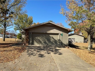 This perfect sized, two bedroom townhouse with Cathedral on Holiday Island Executive Golf Course in Arkansas - for sale on GolfHomes.com, golf home, golf lot