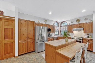 Welcome to 5600 Forest Dr., a stunning 5 bed, 3.5 bath home on 3 on Raintree Country Club in Missouri - for sale on GolfHomes.com, golf home, golf lot