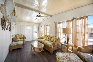 Seller is offering $10,000 to the new buyer for their shares on Twin Isles Country Club in Florida - for sale on GolfHomes.com, golf home, golf lot