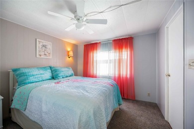 Seller is offering $10,000 to the new buyer for their shares on Twin Isles Country Club in Florida - for sale on GolfHomes.com, golf home, golf lot