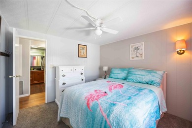 Seller is offering $10,000 to the new buyer for their shares on Twin Isles Country Club in Florida - for sale on GolfHomes.com, golf home, golf lot