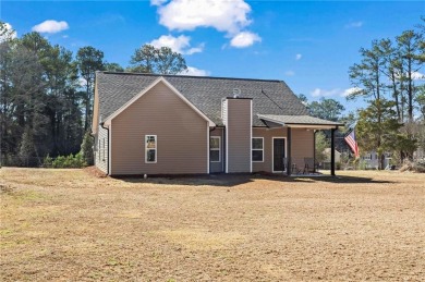 Discover this stunning 3-bedroom, 2-bathroom home, built in 2021 on Creekside Golf and Country Club in Georgia - for sale on GolfHomes.com, golf home, golf lot