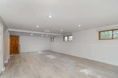 Beautifully updated 4-level split in Oak Meadows offering nearly on St. Andrews Golf and Country Club in Illinois - for sale on GolfHomes.com, golf home, golf lot