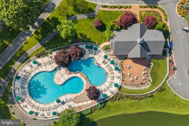 Welcome to 24960 Pot Bunker Way-an exceptional end-unit townhome on Baywood Greens Golf Club in Delaware - for sale on GolfHomes.com, golf home, golf lot