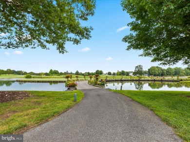 Welcome to 24960 Pot Bunker Way-an exceptional end-unit townhome on Baywood Greens Golf Club in Delaware - for sale on GolfHomes.com, golf home, golf lot