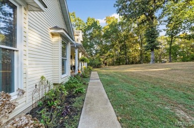 Welcome to 5600 Forest Dr., a stunning 5 bed, 3.5 bath home on 3 on Raintree Country Club in Missouri - for sale on GolfHomes.com, golf home, golf lot