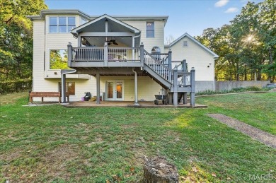 Welcome to 5600 Forest Dr., a stunning 5 bed, 3.5 bath home on 3 on Raintree Country Club in Missouri - for sale on GolfHomes.com, golf home, golf lot