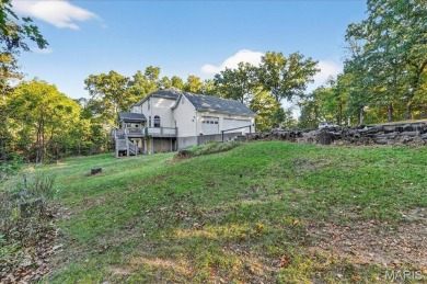 Welcome to 5600 Forest Dr., a stunning 5 bed, 3.5 bath home on 3 on Raintree Country Club in Missouri - for sale on GolfHomes.com, golf home, golf lot