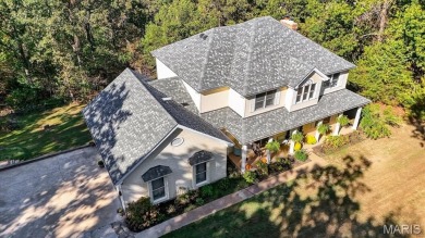 Welcome to 5600 Forest Dr., a stunning 5 bed, 3.5 bath home on 3 on Raintree Country Club in Missouri - for sale on GolfHomes.com, golf home, golf lot