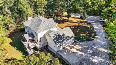 Welcome to 5600 Forest Dr., a stunning 5 bed, 3.5 bath home on 3 on Raintree Country Club in Missouri - for sale on GolfHomes.com, golf home, golf lot