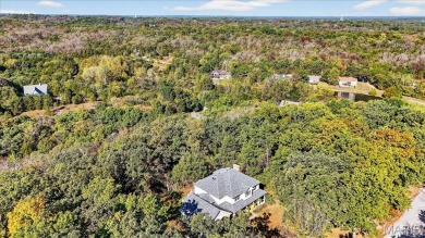 Welcome to 5600 Forest Dr., a stunning 5 bed, 3.5 bath home on 3 on Raintree Country Club in Missouri - for sale on GolfHomes.com, golf home, golf lot