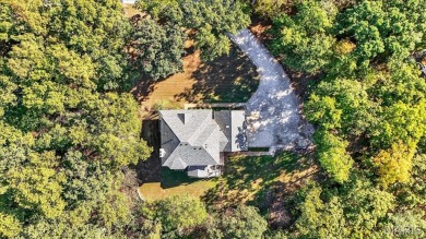 Welcome to 5600 Forest Dr., a stunning 5 bed, 3.5 bath home on 3 on Raintree Country Club in Missouri - for sale on GolfHomes.com, golf home, golf lot