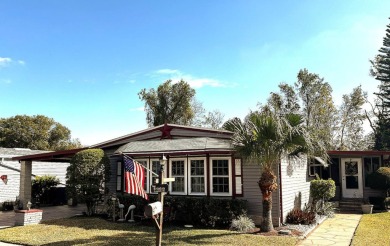 Welcome to your dream home! This spacious gem is perfect for on Lake Henry Golf Club in Florida - for sale on GolfHomes.com, golf home, golf lot