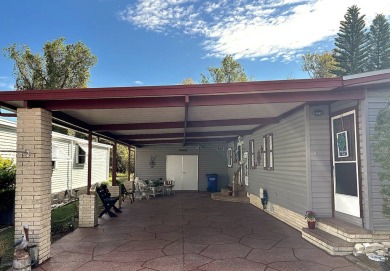 Welcome to your dream home! This spacious gem is perfect for on Lake Henry Golf Club in Florida - for sale on GolfHomes.com, golf home, golf lot