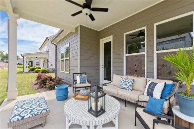 Nestled in the sought-after Traditions of Braselton community on Traditions of Braselton Golf Club in Georgia - for sale on GolfHomes.com, golf home, golf lot