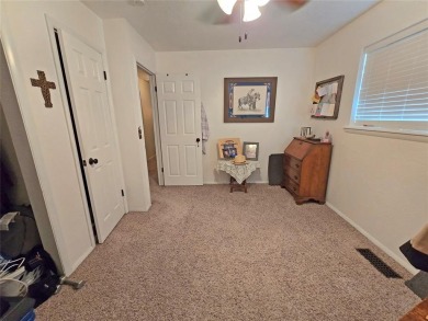 This charming 3 bed, 2 bath home is just minutes away from Lake on Lake Hefner Golf Club in Oklahoma - for sale on GolfHomes.com, golf home, golf lot