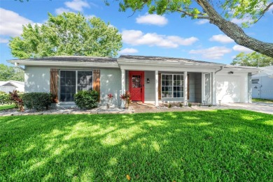 Welcome to 12401 Yorktown Lane, Bayonet Point, FL 34667. Step on Beacon Woods Golf Club in Florida - for sale on GolfHomes.com, golf home, golf lot