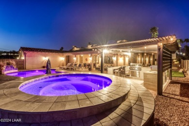 Nestled in the serene beauty of Lake Havasu City, this exquisite on London Bridge Golf Course in Arizona - for sale on GolfHomes.com, golf home, golf lot