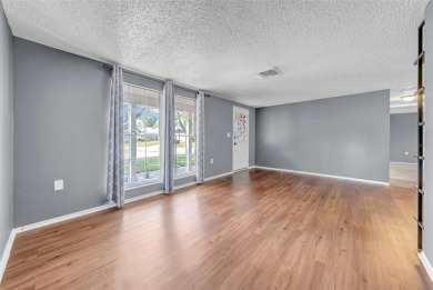 Welcome to 12401 Yorktown Lane, Bayonet Point, FL 34667. Step on Beacon Woods Golf Club in Florida - for sale on GolfHomes.com, golf home, golf lot