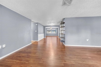 Welcome to 12401 Yorktown Lane, Bayonet Point, FL 34667. Step on Beacon Woods Golf Club in Florida - for sale on GolfHomes.com, golf home, golf lot