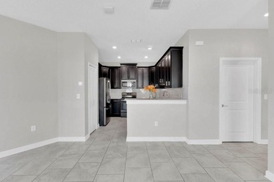 Get ready to enjoy RESORT LIVING on a Wednesday!!! Set on a on ChampionsGate Golf Resort in Florida - for sale on GolfHomes.com, golf home, golf lot