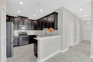 Get ready to enjoy RESORT LIVING on a Wednesday!!! Set on a on ChampionsGate Golf Resort in Florida - for sale on GolfHomes.com, golf home, golf lot