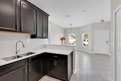 Get ready to enjoy RESORT LIVING on a Wednesday!!! Set on a on ChampionsGate Golf Resort in Florida - for sale on GolfHomes.com, golf home, golf lot