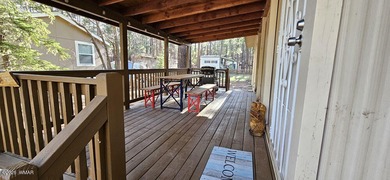 Tucked among the tall pines of Pinetop Lakes Country Club, this on Pinetop Lakes Golf and Country Club in Arizona - for sale on GolfHomes.com, golf home, golf lot