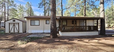 Tucked among the tall pines of Pinetop Lakes Country Club, this on Pinetop Lakes Golf and Country Club in Arizona - for sale on GolfHomes.com, golf home, golf lot