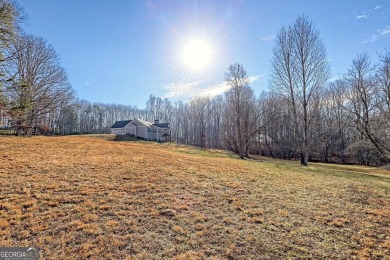 This stunning residence perfectly blends luxury, comfort, and on Old Union Golf Course in Georgia - for sale on GolfHomes.com, golf home, golf lot