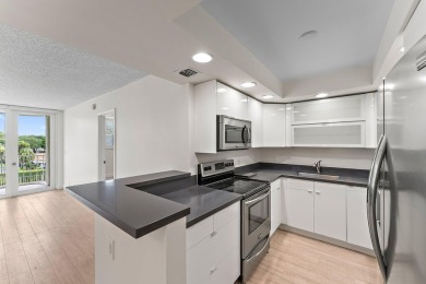 NIicely renovated & freshly painted 2/2 condo in the heart of on North Palm Beach Country Club in Florida - for sale on GolfHomes.com, golf home, golf lot