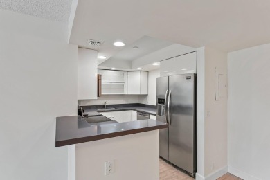 NIicely renovated & freshly painted 2/2 condo in the heart of on North Palm Beach Country Club in Florida - for sale on GolfHomes.com, golf home, golf lot