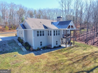 This stunning residence perfectly blends luxury, comfort, and on Old Union Golf Course in Georgia - for sale on GolfHomes.com, golf home, golf lot