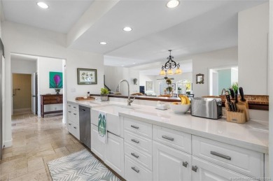 Wonderful corner townhouse w/ exceptional waterfront views! This on Sailfish Point Golf Club, Inc. in Florida - for sale on GolfHomes.com, golf home, golf lot