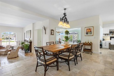 Wonderful corner townhouse w/ exceptional waterfront views! This on Sailfish Point Golf Club, Inc. in Florida - for sale on GolfHomes.com, golf home, golf lot