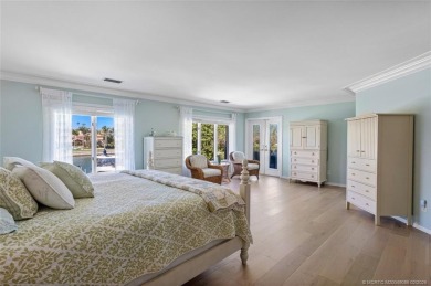 Wonderful corner townhouse w/ exceptional waterfront views! This on Sailfish Point Golf Club, Inc. in Florida - for sale on GolfHomes.com, golf home, golf lot