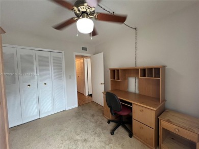 Experience this freshly painted 2-bed, 1-bath condo in a on Palmetto Golf Course in Florida - for sale on GolfHomes.com, golf home, golf lot