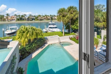 Wonderful corner townhouse w/ exceptional waterfront views! This on Sailfish Point Golf Club, Inc. in Florida - for sale on GolfHomes.com, golf home, golf lot