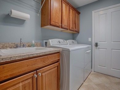 Nestled in the heart of the vibrant 55+ community of The on The Links of Spruce Creek in Florida - for sale on GolfHomes.com, golf home, golf lot