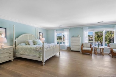 Wonderful corner townhouse w/ exceptional waterfront views! This on Sailfish Point Golf Club, Inc. in Florida - for sale on GolfHomes.com, golf home, golf lot