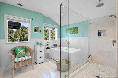 Wonderful corner townhouse w/ exceptional waterfront views! This on Sailfish Point Golf Club, Inc. in Florida - for sale on GolfHomes.com, golf home, golf lot