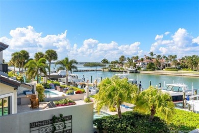 Wonderful corner townhouse w/ exceptional waterfront views! This on Sailfish Point Golf Club, Inc. in Florida - for sale on GolfHomes.com, golf home, golf lot