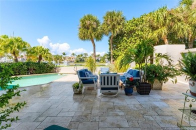 Wonderful corner townhouse w/ exceptional waterfront views! This on Sailfish Point Golf Club, Inc. in Florida - for sale on GolfHomes.com, golf home, golf lot