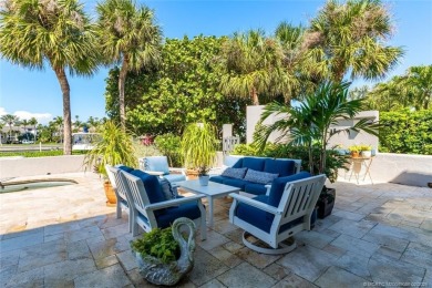 Wonderful corner townhouse w/ exceptional waterfront views! This on Sailfish Point Golf Club, Inc. in Florida - for sale on GolfHomes.com, golf home, golf lot