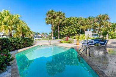 Wonderful corner townhouse w/ exceptional waterfront views! This on Sailfish Point Golf Club, Inc. in Florida - for sale on GolfHomes.com, golf home, golf lot