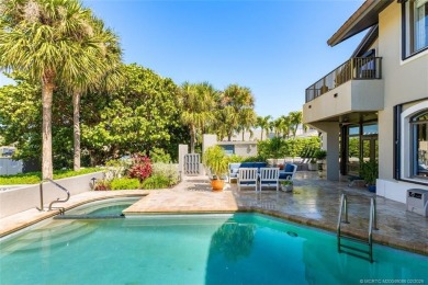Wonderful corner townhouse w/ exceptional waterfront views! This on Sailfish Point Golf Club, Inc. in Florida - for sale on GolfHomes.com, golf home, golf lot
